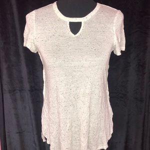 white top with black speckles